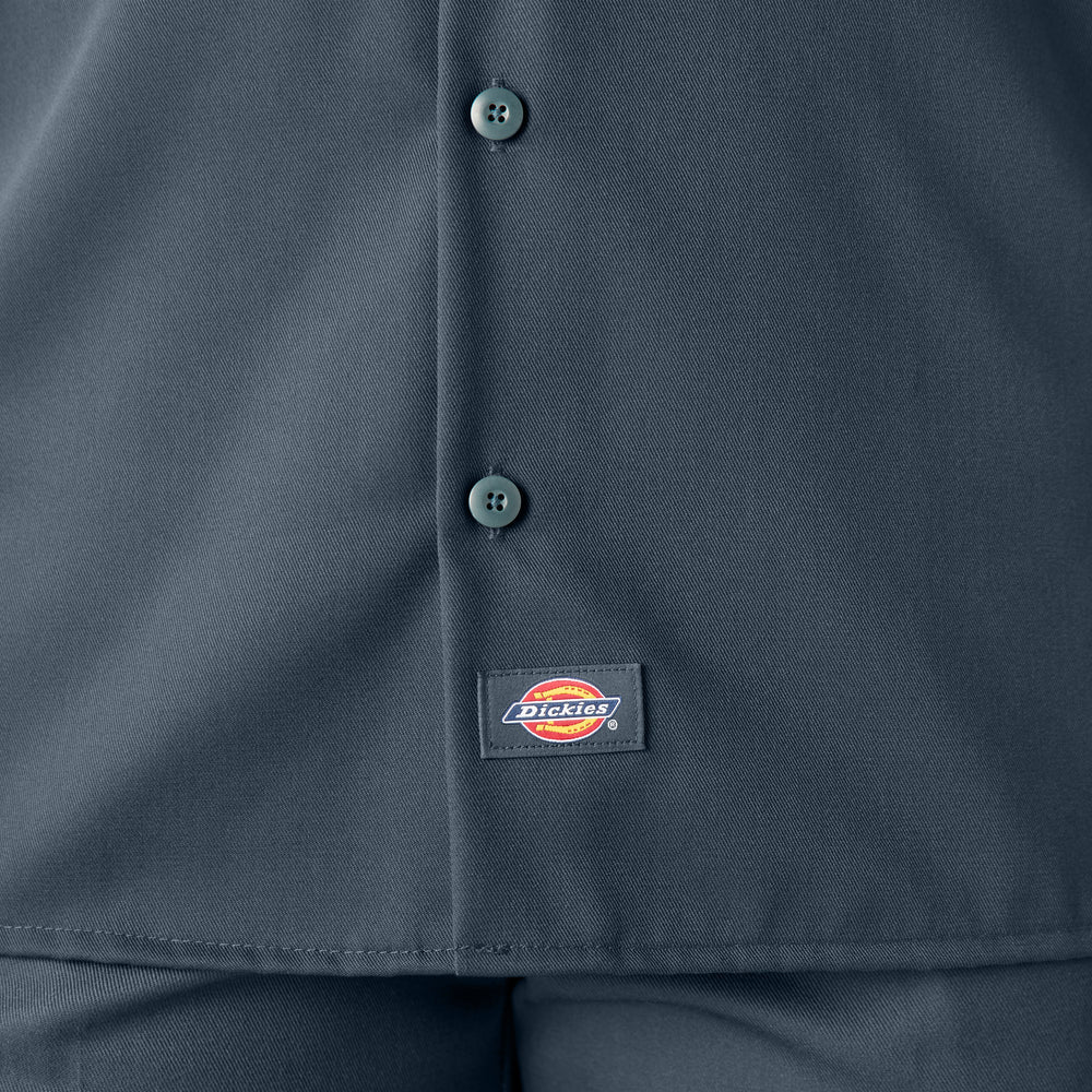 Navy blue shirt with Dickies logo on a button